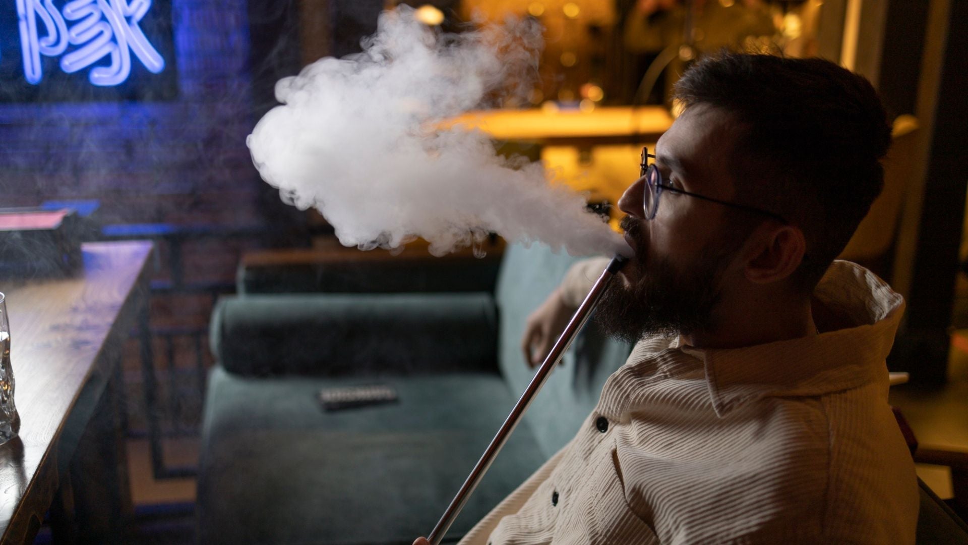 An Indian guy vaping different types of vape in Malaysia